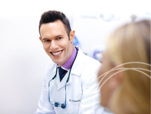 dentist smiling at patient